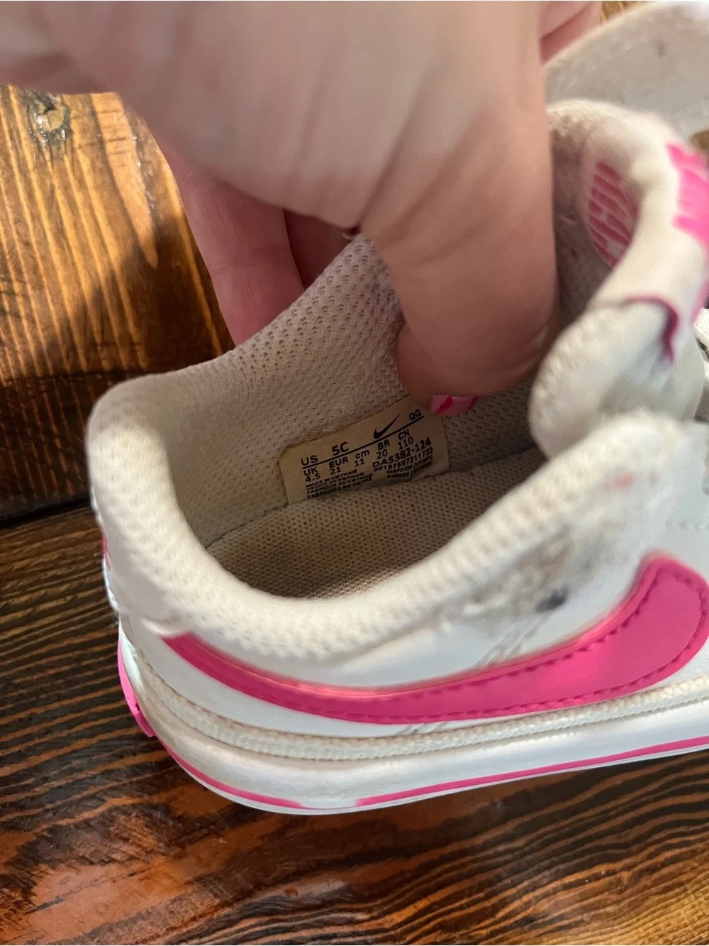 Nike Kids White Sneakers with Pink Swoosh and Pink Stripe